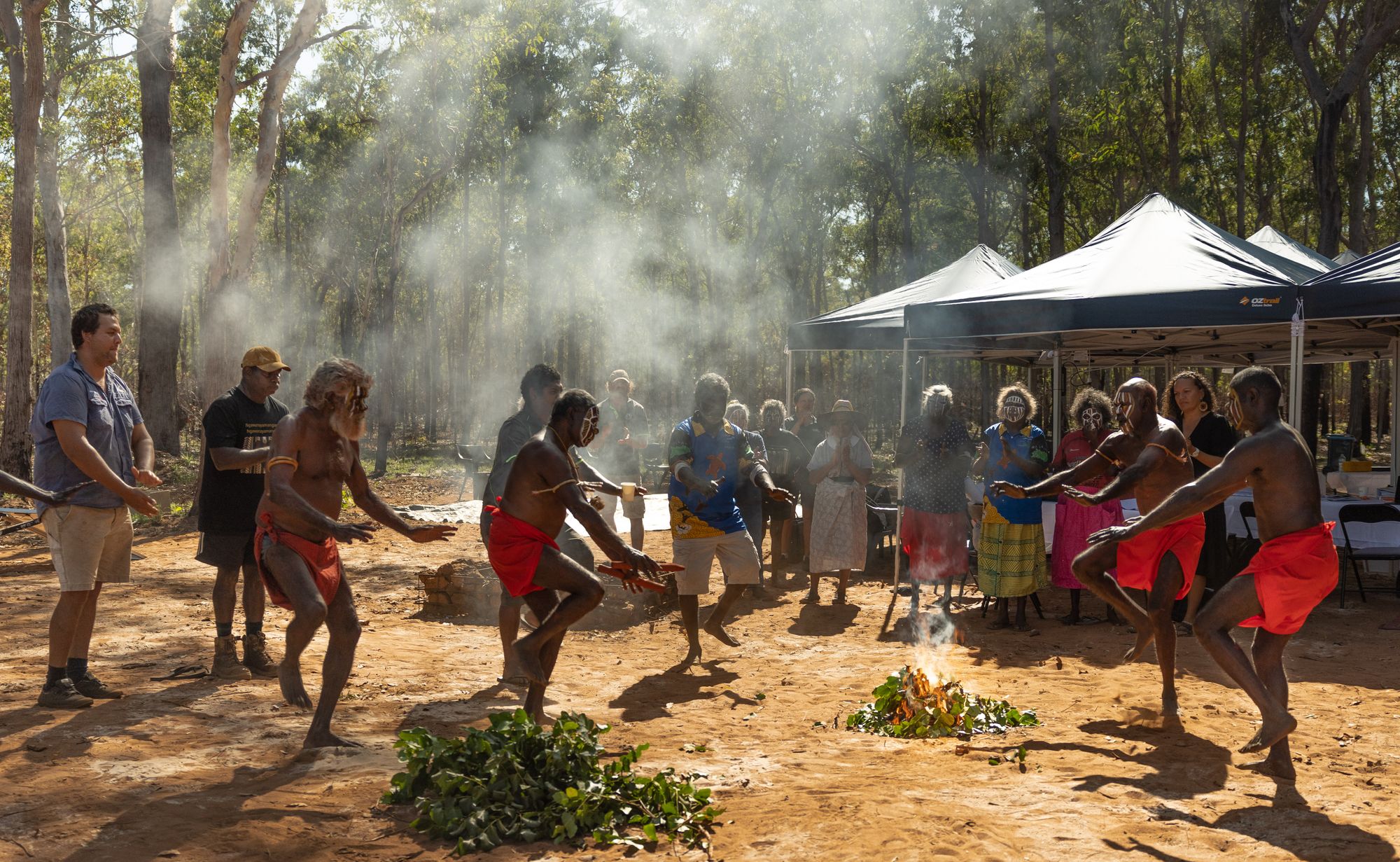 Munupi elders welcome the Australian federal court to the Tiwi Islands with a boat dance